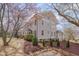 Stately two-story home with well-maintained landscaping and flowering trees at 301 Hillsborough St, Chapel Hill, NC 27514