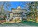 Charming two-story home featuring a screened porch and beautifully landscaped backyard at 301 Hillsborough St, Chapel Hill, NC 27514