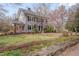 Beautiful two-story home with a covered porch and well-maintained lawn at 301 Hillsborough St, Chapel Hill, NC 27514