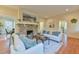 Spacious living room has a stone fireplace and an open floor plan at 301 Hillsborough St, Chapel Hill, NC 27514