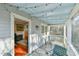 Cozy outdoor porch with string lights, furniture, and a view of the outdoor scenery at 301 Hillsborough St, Chapel Hill, NC 27514