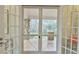 Enclosed porch features stone posts and French doors to the home's interior at 301 Hillsborough St, Chapel Hill, NC 27514