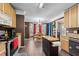 Kitchen offers a view of the breakfast nook and features modern appliances at 304 Briarwood Dr, Mebane, NC 27302