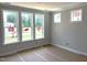 Well-lit bedroom with large windows offering serene views of the neighborhood at 3200 Balcon Ct # 28, Angier, NC 27501