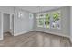 Dining room with bright light, multiple windows and modern light fixture at 3200 Balcon Ct # 28, Angier, NC 27501