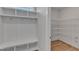 Convenient mudroom with custom storage, shelving, and adjacent pantry at 3200 Balcon Ct # 28, Angier, NC 27501