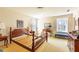 Bedroom with bed frame, desk and two windows providing great natural light at 350 W Lake Trl, Mebane, NC 27302