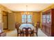 Traditional dining room featuring a chandelier, wallpaper, and dining set at 350 W Lake Trl, Mebane, NC 27302