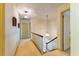 Hallway features pendant lights and access to other rooms in the home at 350 W Lake Trl, Mebane, NC 27302