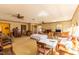 Large living room with multiple ceiling fans, a bed, and comfortable seating arrangement at 350 W Lake Trl, Mebane, NC 27302