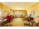 Warm and inviting living room with vintage decor, large windows, and decorative trim at 350 W Lake Trl, Mebane, NC 27302