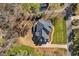 Overhead view of home featuring a well-manicured lawn, roof details, and surrounding greenery at 3905 Grandbridge Dr, Apex, NC 27539