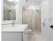 A bathroom features a vanity, toilet, and glass shower at 3905 Grandbridge Dr, Apex, NC 27539
