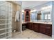 This bathroom offers double sinks, a tile shower, and vanity at 3905 Grandbridge Dr, Apex, NC 27539