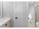 Well-lit bathroom with vanity and sink, conveniently connected to the toilet and shower at 3905 Grandbridge Dr, Apex, NC 27539