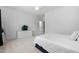 The bedroom features a neutral color scheme, window, and ceiling fan at 3905 Grandbridge Dr, Apex, NC 27539