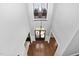 Grand foyer with double doors, dark wood flooring, and chandelier at 3905 Grandbridge Dr, Apex, NC 27539