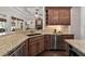 Well-appointed kitchen with granite countertops, stainless appliances, and hardwood floors at 3905 Grandbridge Dr, Apex, NC 27539