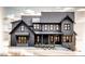 Charming two-story home with board and batten siding, stone accents, and a welcoming front porch at 422 Lower Thrift Rd, New Hill, NC 27562