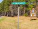 Street sign marking Lower Thrift Rd next to Jordan Game Land at 422 Lower Thrift Rd, New Hill, NC 27562