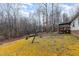 Spacious backyard with a wooden deck and plenty of space for outdoor activities at 441 Wintergreen Rd, Timberlake, NC 27583