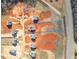 An aerial view of the property with a blue outline, showcasing its prime location and surroundings at 4889 Grosbeak Ct, Mebane, NC 27302