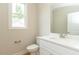 Bathroom featuring hardwood floors, toilet, and single sink vanity at 4889 Grosbeak Ct, Mebane, NC 27302