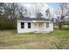 Inviting single-story home with a freshly painted exterior and a welcoming entrance at 501 N 14Th St, Erwin, NC 28339