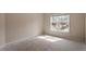 A bedroom featuring a double window that lets in ample natural light at 5029 Stonewood Pines Dr, Knightdale, NC 27545