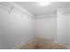 A walk-in closet featuring wire shelving with room to hang and store clothing at 5029 Stonewood Pines Dr, Knightdale, NC 27545