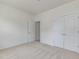 Empty bedroom with carpet, neutral paint and two closets at 568 Winding Creek Dr, Lillington, NC 27546