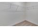 Walk in closet showing wire shelving and carpeted floor at 568 Winding Creek Dr, Lillington, NC 27546