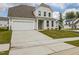 Well-maintained home with a two-car garage and a spacious driveway at 568 Winding Creek Dr, Lillington, NC 27546