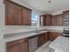 Beautiful kitchen with granite countertops and stainless steel dishwasher at 568 Winding Creek Dr, Lillington, NC 27546