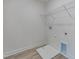 Convenient laundry room with modern hookups and shelving for storage at 568 Winding Creek Dr, Lillington, NC 27546