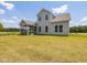 Spacious backyard with a screened-in porch, perfect for enjoying the outdoors in comfort at 580 Winding Creek Dr, Lillington, NC 27546