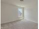 Bedroom with carpet, a window and white trim at 580 Winding Creek Dr, Lillington, NC 27546