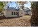 Back exterior with door and windows in an undeveloped backyard at 704 Pender Street St, Rocky Mount, NC 27801