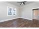 Bright bedroom has hardwood floors and a large window to let in light at 704 Pender Street St, Rocky Mount, NC 27801