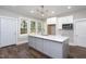 Modern kitchen boasts a large island, stainless steel appliances, and ample cabinet space at 704 Pender St, Rocky Mount, NC 27801