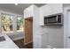 Updated kitchen with modern stainless steel appliances and ample cabinet space at 704 Pender St, Rocky Mount, NC 27801