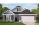 Charming single-Gathering home with a two-car garage, lush lawn and neutral-tone siding at 7573 Percussion Dr, Apex, NC 27539