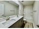 Elegant bathroom with double sink vanity, modern fixtures, and a pristine shower-tub combination at 768 Riguard Way, Wendell, NC 27591