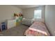 Comfortable bedroom with a crib, plush toys, and a colorful bed, perfect for a space at 768 Riguard Way, Wendell, NC 27591