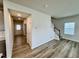 Spacious living room showcasing wood floors and an entry hallway at 768 Riguard Way, Wendell, NC 27591