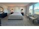 Comfortable main bedroom offering abundant natural light, with views of the surrounding neighborhood at 768 Riguard Way, Wendell, NC 27591