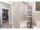 Tiled bathroom with shower-tub combo at 7936 Nc 42, Holly Springs, NC 27540