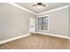 Bedroom with neutral paint, carpet, ceiling fan, and natural light at 7936 Nc 42, Holly Springs, NC 27540