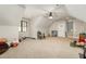 Large bonus room featuring carpet, ceiling fan, and many toys at 7936 Nc 42, Holly Springs, NC 27540