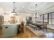 Open-concept kitchen and dining area with granite counters and stainless steel appliances at 7936 Nc 42, Holly Springs, NC 27540